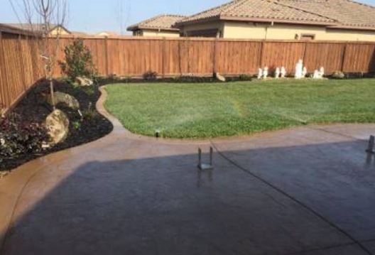 new picture of a concrete patio in the backyard of jackson, ca